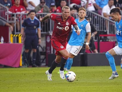 Jul 23, 2022; Toronto, Ontario, CAN; Toronto FC midfielder Federico Bernardeschi (10) chases after the ball against Charlotte FC at BMO Field. Mandatory Credit: John E. Sokolowski-USA TODAY Sports