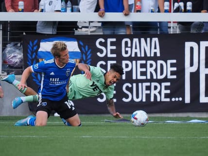 Apr 2, 2022; San Jose, California, USA; San Jose Earthquakes midfielder Jackson Yueill (14) fouls Austin FC midfielder Daniel Pereira (6) for penalty kick during the second half at PayPal Park. Mandatory Credit: Kelley L Cox-USA TODAY Sports