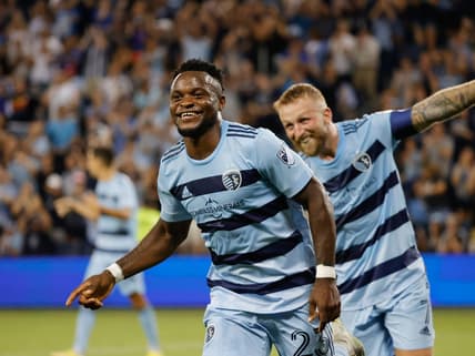 Aug 21, 2022; Kansas City, Kansas, USA; Sporting Kansas City forward William Agada (23) celebrates with forward Johnny Russell (7) after scoring goal at Children's Mercy Park. Mandatory Credit: Gary Rohman-USA TODAY Sports