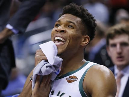 Jan 31, 2019; Toronto, Ontario, CAN; Milwaukee Bucks forward Giannis Antetokounmpo (34) smiles on the bench during a break against the Toronto Raptors at Scotiabank Arena. Milwaukee Bucks defeated Toronto. Mandatory Credit: John E. Sokolowski-USA TODAY Sports