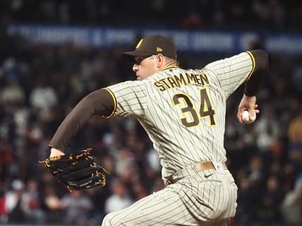 Apr 11, 2022; San Francisco, California, USA; San Diego Padres relief pitcher Craig Stammen (34) pitches the ball against the San Francisco Giants during the seventh inning at Oracle Park. Mandatory Credit: Kelley L Cox-USA TODAY Sports