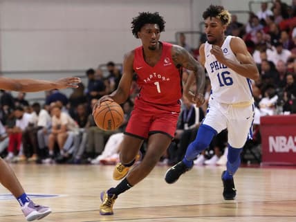 Jul 9, 2022; Las Vegas, NV, USA; Toronto Raptors guard Armoni Brooks (1) dribbles away from Philadelphia 76ers guard Charlie Brown Jr. (16) during an NBA Summer League game at Cox Pavilion. Mandatory Credit: Stephen R. Sylvanie-USA TODAY Sports