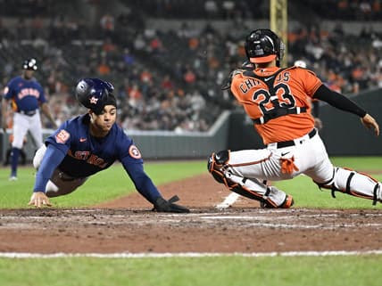 Sep 24, 2022; Baltimore, Maryland, USA;  Houston Astros shortstop Jeremy Pena (3) slides safely into home plate against the Baltimore Orioles during the fifth inning at Oriole Park at Camden Yards. Mandatory Credit: James A. Pittman-USA TODAY Sports