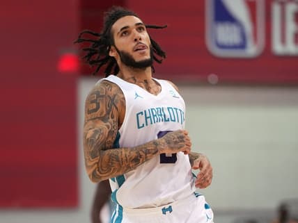 Jul 13, 2022; Las Vegas, NV, USA; Charlotte Hornets forward LiAngelo Ball (8) looks on during an NBA Summer League game against the Cleveland Cavaliers at Cox Pavilion. Mandatory Credit: Stephen R. Sylvanie-USA TODAY Sports