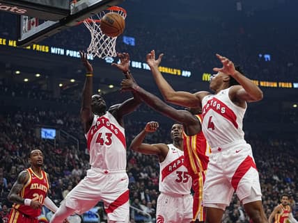 Oct 31, 2022; Toronto, Ontario, CAN; Toronto Raptors forward Pascal Siakam (43) and forward Scottie Barnes (4) go after a rebound against the Atlanta Hawks during the first quarter at Scotiabank Arena. Mandatory Credit: John E. Sokolowski-USA TODAY Sports