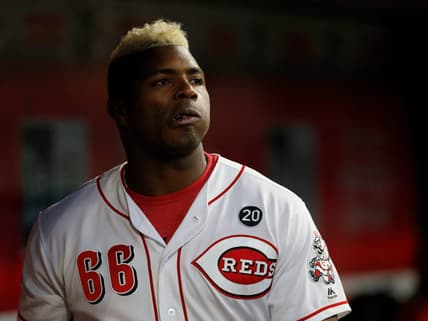 Cincinnati Reds right fielder Yasiel Puig (66) throws a handful of sunflower seeds into his mouth in the seventh inning of the MLB National League game between the Cincinnati Reds and the Chicago Cubs at Great American Ball Park in downtown Cincinnati on Tuesday, May 14, 2019. The Cubs took the first game of the series, 3-1.

Chicago Cubs At Cincinnati Reds