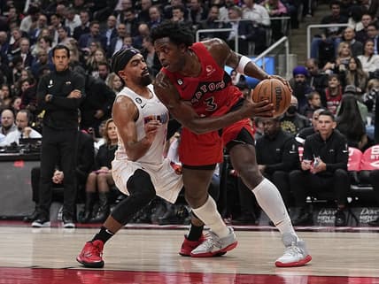 Nov 16, 2022; Toronto, Ontario, CAN; Miami Heat guard Gabe Vincent (2) defends against Toronto Raptors forward O.G. Anunoby (3) during the first half at Scotiabank Arena. Mandatory Credit: John E. Sokolowski-USA TODAY Sports
