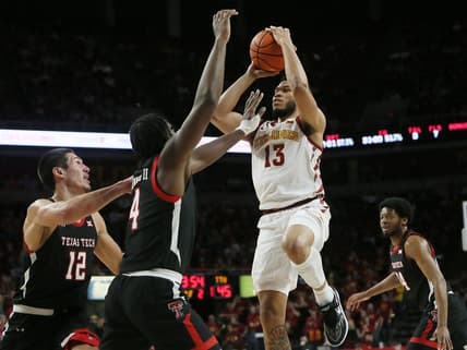 Iowa State University Cyclones guard Jaren Holmes (13) takes a shot over Texas Tech Red Raiders forward Robert Jennings (4) and forward Daniel Batcho (12)  during the second half at Hilton Coliseum Tuesday, Jan 10, 2023, in Ames, Iowa.  Photo by Nirmalendu Majumdar/Ames Tribune

Trxas Tech And Iowa State Men S Basketball
