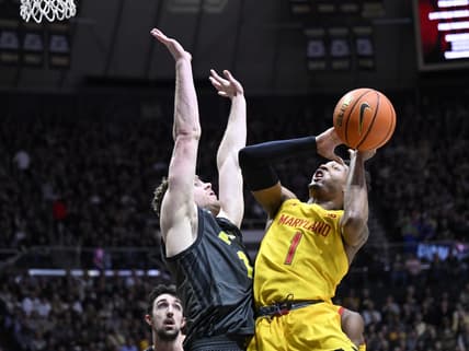 Jan 22, 2023; West Lafayette, Indiana, USA; Maryland Terrapins guard Jahmir Young (1) shoots the ball against Purdue Boilermakers forward Caleb Furst (1) during the first half at Mackey Arena. Mandatory Credit: Marc Lebryk-USA TODAY Sports