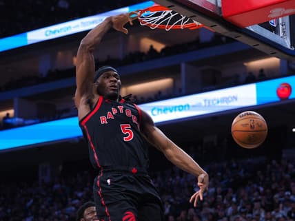 Jan 25, 2023; Sacramento, California, USA; Toronto Raptors center Precious Achiuwa (5) dunks against the Sacramento Kings during the first quarter at Golden 1 Center. Mandatory Credit: Kelley L Cox-USA TODAY Sports