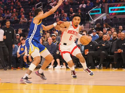 Feb 24, 2023; San Francisco, California, USA; Houston Rockets KJ Martin Jr. (6) is fouled by Golden State Warriors Jordan Poole (3) during the first quarter at Chase Center. Mandatory Credit: Kelley L Cox-USA TODAY Sports