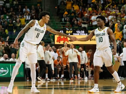 Feb 25, 2023; Waco, Texas, USA;  Baylor Bears forward Jalen Bridges (11) and Baylor Bears guard Adam Flagler (10) celebrates after a play against the Texas Longhorns during the second half at Ferrell Center. Mandatory Credit: Chris Jones-USA TODAY Sports