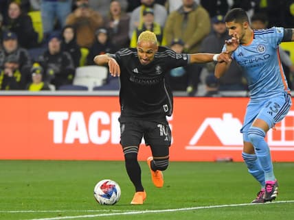 Feb 25, 2023; Nashville, Tennessee, USA;  Nashville SC midfielder Hany Mukhtar (10) dribbles against the New York City during the second half at Geodis Park. Mandatory Credit: Steve Roberts-USA TODAY Sports