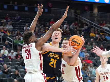 Mar 8, 2023; Las Vegas, NV, USA; Washington State Cougars guard Kymany Houinsou (31) and Washington State Cougars center Jack Wilson (21) defend against California Golden Bears forward Lars Thiemann (21) during the first half at T-Mobile Arena. Mandatory Credit: Stephen R. Sylvanie-USA TODAY Sports