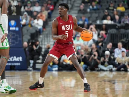 Mar 9, 2023; Las Vegas, NV, USA; Washington State Cougars guard TJ Bamba (5) dribbles against the Oregon Ducks during the second half at T-Mobile Arena. Mandatory Credit: Stephen R. Sylvanie-USA TODAY Sports
