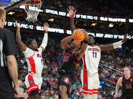 Mar 9, 2023; Las Vegas, NV, USA; Stanford Cardinal forward Harrison Ingram (55) attempts to shoot between Arizona Wildcats guard Courtney Ramey (0) and center Oumar Ballo (11) during the first half at T-Mobile Arena. Mandatory Credit: Stephen R. Sylvanie-USA TODAY Sports