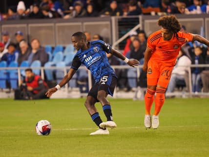 Apr 1, 2023; San Jose, California, USA; San Jose Earthquakes midfielder Jamiro Monteiro (35) controls the ball ahead of Houston Dynamo midfielder Adalberto Carrasquilla (20) during the first half at PayPal Park. Mandatory Credit: Kelley L Cox-USA TODAY Sports