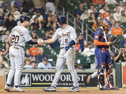 Apr 3, 2023; Houston, Texas, USA; Detroit Tigers first baseman Spencer Torkelson (20) celebrates right fielder Matt Vierling (8) two-run home run against the Houston Astros in the eleventh inning at Minute Maid Park. Mandatory Credit: Thomas Shea-USA TODAY Sports