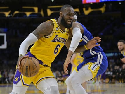 May 12, 2023; Los Angeles, California, USA; Los Angeles Lakers forward LeBron James (6) is defended by Golden State Warriors guard Moses Moody (4) as he drives to the basket in the first half of game six of the 2023 NBA playoffs at Crypto.com Arena. Mandatory Credit: Jayne Kamin-Oncea-USA TODAY Sports
