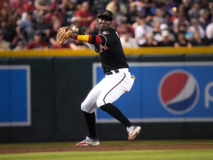Jun 17, 2023; Phoenix, AZ, USA; Arizona Diamondbacks infielder Geraldo Perdomo (2) throws to first base after fielding a grounder against the Cleveland Guardians at Chase Field.