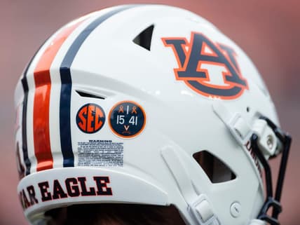 A decal on Auburn helmets honoring the University of Virginia players killed earlier this week that were killed as Auburn Tigers take on Western Kentucky Hilltoppers at Jordan-Hare Stadium in Auburn, Ala., on Saturday, Nov. 19, 2022.
