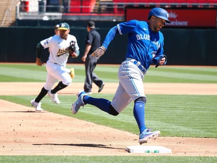Sep 4, 2023; Oakland, California, USA; Toronto Blue Jays right fielder George Springer (4) rounds third base for a run against the Oakland Athletics during the fifth inning at Oakland-Alameda County Coliseum. Mandatory Credit: Kelley L Cox-USA TODAY Sports