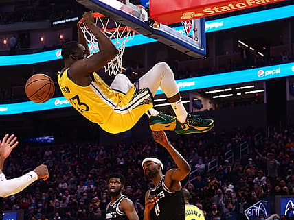 Dec 20, 2021; San Francisco, California, USA; Golden State Warriors forward Draymond Green (23) dunks the ball above Sacramento Kings forward-guard Maurice Harkless (8) during the fourth quarter at Chase Center. Mandatory Credit: Kelley L Cox-USA TODAY Sports