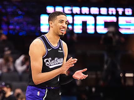 Dec 28, 2021; Sacramento, California, USA; Sacramento Kings guard Tyrese Haliburton (0) claps his hands after a play against the Oklahoma City Thunder during the fourth quarter at Golden 1 Center. Mandatory Credit: Kelley L Cox-USA TODAY Sports