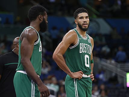 Nov 3, 2021; Orlando, Florida, USA; Boston Celtics forward Jayson Tatum (0) and guard Jaylen Brown (7) talk against the Orlando Magic during the second half at Amway Center. Mandatory Credit: Kim Klement-USA TODAY Sports