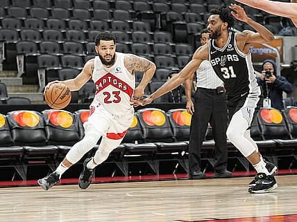 Jan 4, 2022; Toronto, Ontario, CAN; Toronto Raptors guard Fred VanVleet (23) drives to the net against San Antonio Spurs forward Keita Bates-Diop (31) during the second half at Scotiabank Arena. Mandatory Credit: John E. Sokolowski-USA TODAY Sports