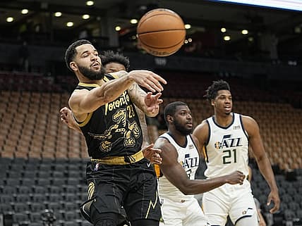 Jan 7, 2022; Toronto, Ontario, CAN; Toronto Raptors guard Fred VanVleet (23) passes the ball against the Utah Jazz during the first quarter at Scotiabank Arena. Mandatory Credit: John E. Sokolowski-USA TODAY Sports