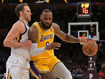 Jan 17, 2022; Los Angeles, California, USA;  Utah Jazz forward Bojan Bogdanovic (44) guards Los Angeles Lakers forward LeBron James (6) in the first half of the game at Crypto.com Arena. Mandatory Credit: Jayne Kamin-Oncea-USA TODAY Sports