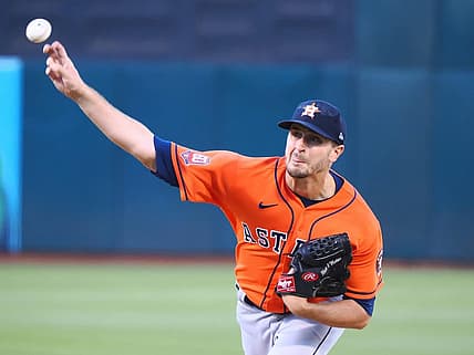 Jul 25, 2022; Oakland, California, USA; Houston Astros starting pitcher Jake Odorizzi (17) throws a pitch against the Oakland Athletics during the first inning at RingCentral Coliseum. Mandatory Credit: Kelley L Cox-USA TODAY Sports