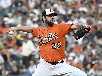 Jul 23, 2022; Baltimore, Maryland, USA;  Baltimore Orioles starting pitcher Jordan Lyles (28) delivers against the New York Yankees during the first inning at Oriole Park at Camden Yards. Mandatory Credit: James A. Pittman-USA TODAY Sports