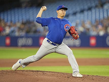 Aug 29, 2022; Toronto, Ontario, CAN; Chicago Cubs starting pitcher Javier Assad (72) pitches to the Toronto Blue Jays during the first inning at Rogers Centre. Mandatory Credit: John E. Sokolowski-USA TODAY Sports