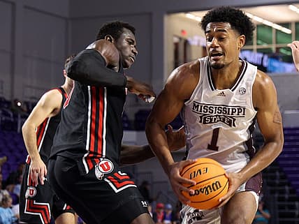 Nov 23, 2022; Fort Myers, Florida, USA;  Mississippi State Bulldogs forward Tolu Smith (1) drives to the hoop past Utah Utes center Keba Keita (13) in the second half during the Fort Myers Tip-Off Beach Division championship game at Suncoast Credit Union Arena. Mandatory Credit: Nathan Ray Seebeck-USA TODAY Sports