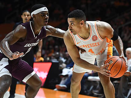 Tennessee guard Tyreke Key (4) is guarded by Eastern Kentucky guard Tayshawn Comer (1) during the NCAA college basketball game between Tennessee and Eastern Kentucky on Wednesday, December 7, 2022 in Knoxville, Tenn.

Ut Hoops Eastern Ky