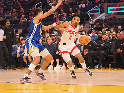 Feb 24, 2023; San Francisco, California, USA; Houston Rockets KJ Martin Jr. (6) is fouled by Golden State Warriors Jordan Poole (3) during the first quarter at Chase Center. Mandatory Credit: Kelley L Cox-USA TODAY Sports