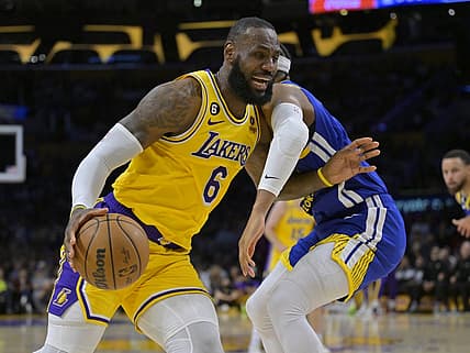 May 12, 2023; Los Angeles, California, USA; Los Angeles Lakers forward LeBron James (6) is defended by Golden State Warriors guard Moses Moody (4) as he drives to the basket in the first half of game six of the 2023 NBA playoffs at Crypto.com Arena. Mandatory Credit: Jayne Kamin-Oncea-USA TODAY Sports