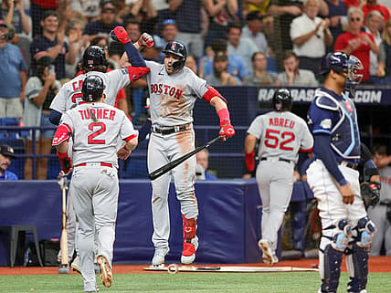 Sep 4, 2023; St. Petersburg, Florida, USA; Boston Red Sox right fielder Adam Duvall (18) congratulates first baseman Triston Casas (36) after hitting a there-run home run against the Tampa Bay Rays in the sixth inning at Tropicana Field. Mandatory Credit: Nathan Ray Seebeck-USA TODAY Sports