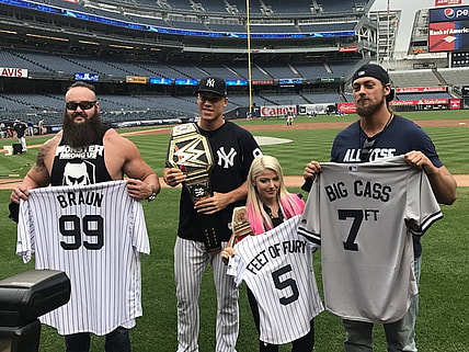 Aaron Judge receives championship belt from these WWE superstars.