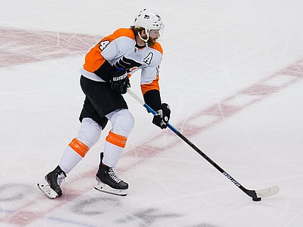 Aug 30, 2020; Toronto, Ontario, CAN; Philadelphia Flyers forward Sean Couturier (14) carries the puck against the New York Islanders in game three of the second round of the 2020 Stanley Cup Playoffs at Scotiabank Arena. Mandatory Credit: John E. Sokolowski-USA TODAY Sports