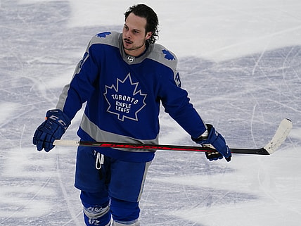 Feb 24, 2021; Toronto, Ontario, CAN; Toronto Maple Leafs forward Auston Matthews (34) heads for the penalty box against the Calgary Flames during the third period at Scotiabank Arena. Mandatory Credit: John E. Sokolowski-USA TODAY Sports