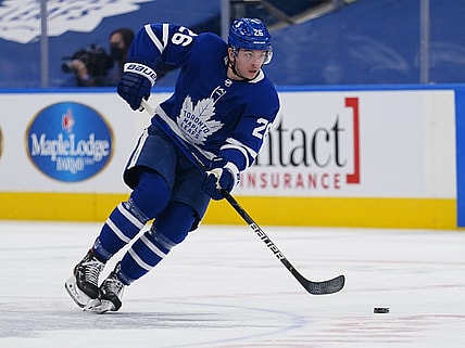 Feb 17, 2021; Toronto, Ontario, CAN; Toronto Maple Leafs forward Jimmy Vesey (26) controls the puck against the Ottawa Senators during the first period at Scotiabank Arena. Mandatory Credit: John E. Sokolowski-USA TODAY Sports