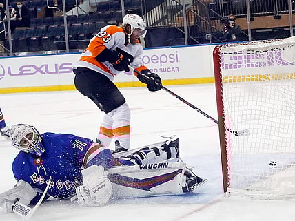 Mar 15, 2021; New York, New York, USA;  Jakub Voracek #93 of the Philadelphia Flyers scores at 3:47 of overtime against Keith Kinkaid #71 of the New York Rangers at Madison Square Garden on March 15, 2021 in New York City. The Flyers defeated the Rangers 5-4 in overtime.  Mandatory Credit:  Bruce Bennett/POOL PHOTOS-USA TODAY Sports