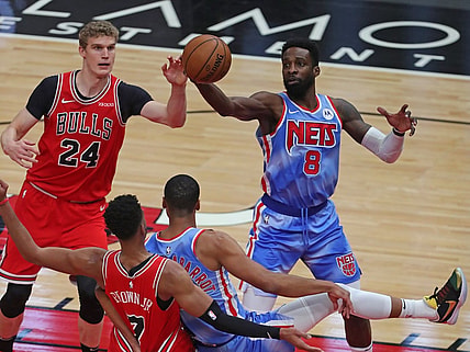 Apr 4, 2021; Chicago, Illinois, USA; Chicago Bulls forward Lauri Markkanen (24) and Brooklyn Nets forward Jeff Green (8) fight for a rebound during the second quarter at the United Center. Mandatory Credit: Dennis Wierzbicki-USA TODAY Sports