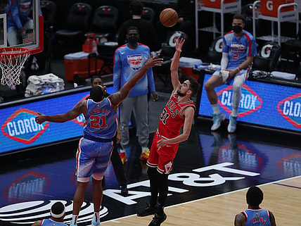 Apr 4, 2021; Chicago, Illinois, USA; Chicago Bulls guard Tomas Satoransky (31) scores over Brooklyn Nets center LaMarcus Aldridge (21) during the third quarter at the United Center. Mandatory Credit: Dennis Wierzbicki-USA TODAY Sports