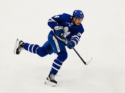 Apr 7, 2021; Toronto, Ontario, CAN; Toronto Maple Leafs forward Auston Matthews (34) shoots the puck against the Montreal Canadiens during the first period at Scotiabank Arena. Mandatory Credit: John E. Sokolowski-USA TODAY Sports