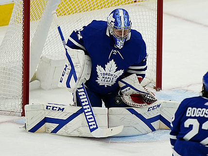 Apr 15, 2021; Toronto, Ontario, CAN; Toronto Maple Leafs goaltender David Rittich (33) makes a save against the Winnipeg Jets during the second period at Scotiabank Arena. Mandatory Credit: John E. Sokolowski-USA TODAY Sports