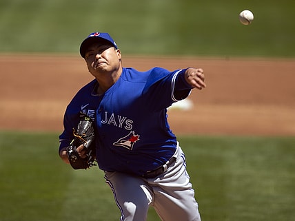 May 6, 2021; Oakland, California, USA; Toronto Blue Jays starting pitcher Hyun Jin Ryu (99) delivers a pitch against the Oakland Athletics during the second inning at RingCentral Coliseum. Mandatory Credit: D. Ross Cameron-USA TODAY Sports